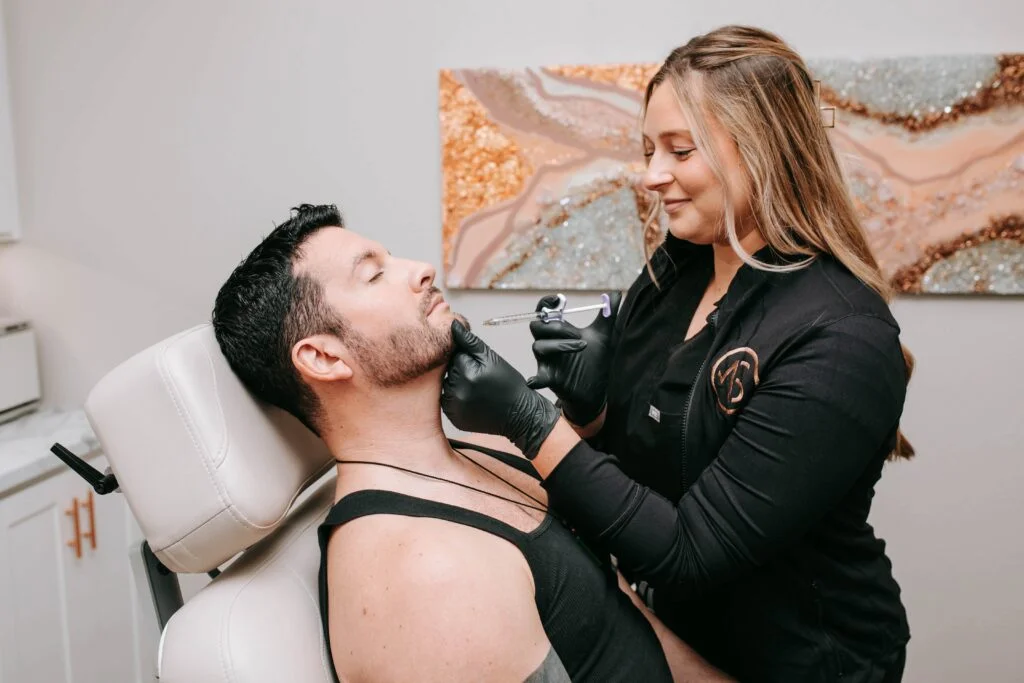 Dermal Filler injection given on man's face | ANEU Medical Spa, LLC | Madison | McFarland, WI