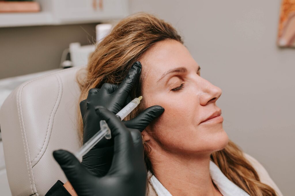 Sculptra injection given on woman's face | ANEU Medical Spa, LLC | Madison | McFarland, WI
